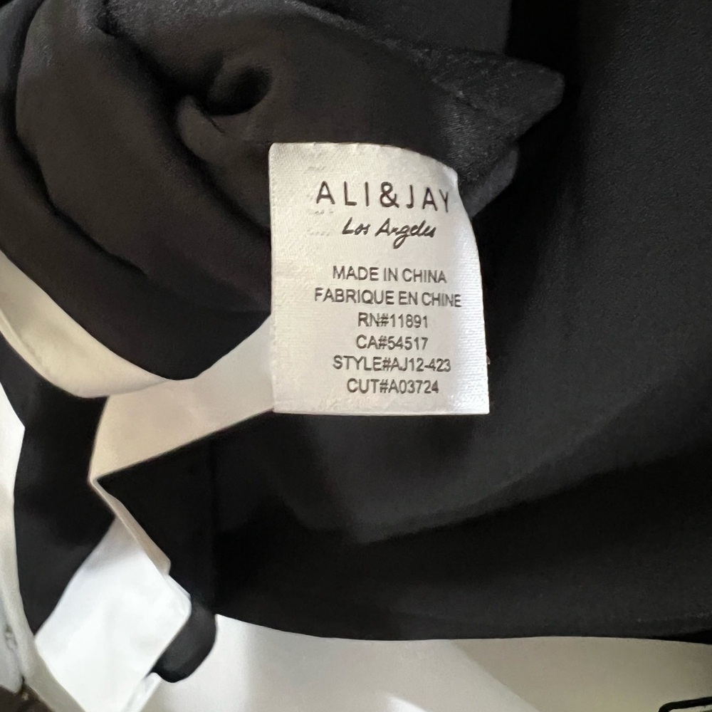 ALI & JAY Elegant Black Dress with White Accents - Picture 10 of 10